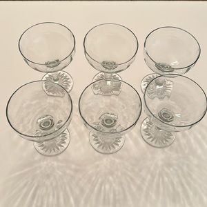 6 Clear Glass Goblets About 4” Tall & Hold 3/4 Cup of Liquid.